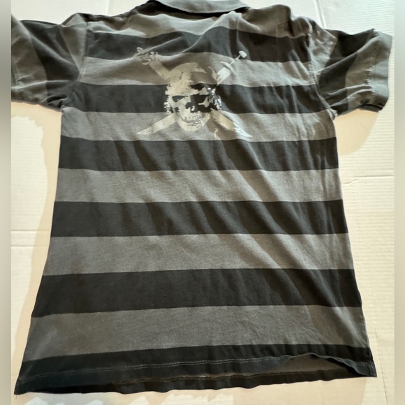 NWOT Men’s distressed Pirates of the Caribbean polo from Disneyland. - Picture 3 of 12